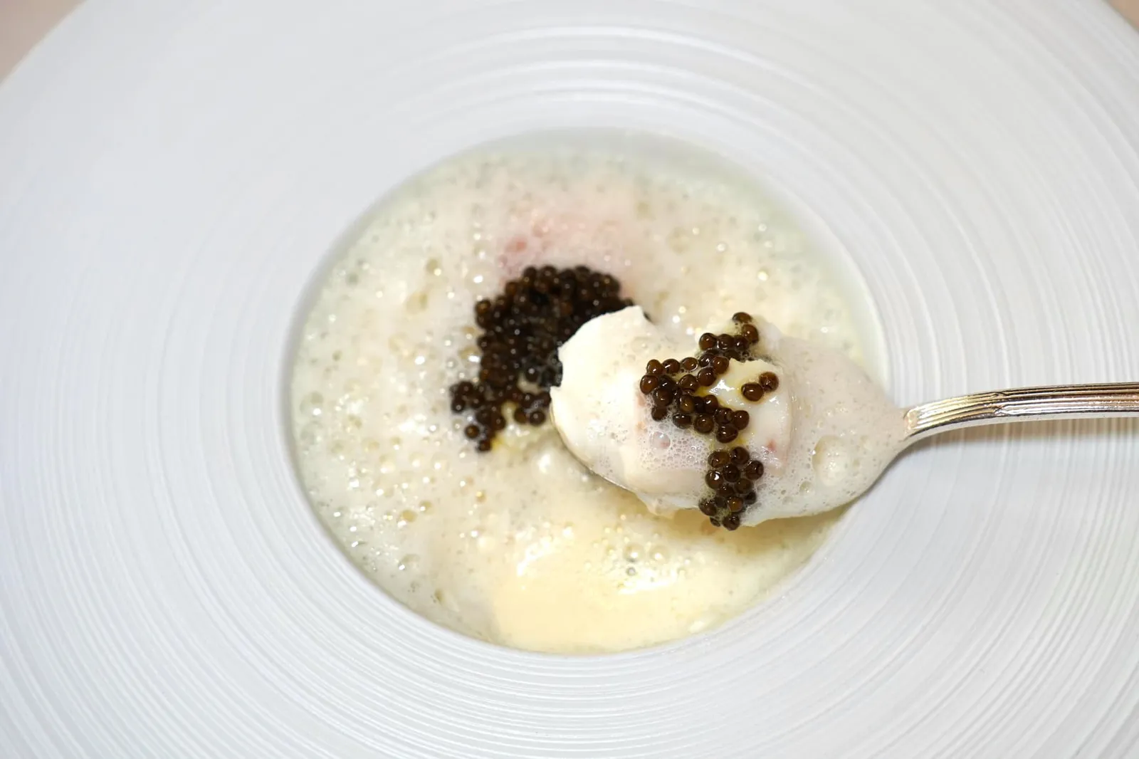 « JACQUES PIC » SEA BASS WITH CAVIAR For fans of the mythical dish of my father created in 1971 Supplement CHF 50.- in replacement of the Fish from Lake. ทั้งนี้ Filet de Loup au Caviar ยังเป็นอาหารฝรั่งเศสจานแรกในประวัติศาสตร์ที่มีจัดวาง Caviar ซึ่งเป็นของเย็นมาในอาหารจานร้อน (Warm Dish) อีกด้วย (20/20)