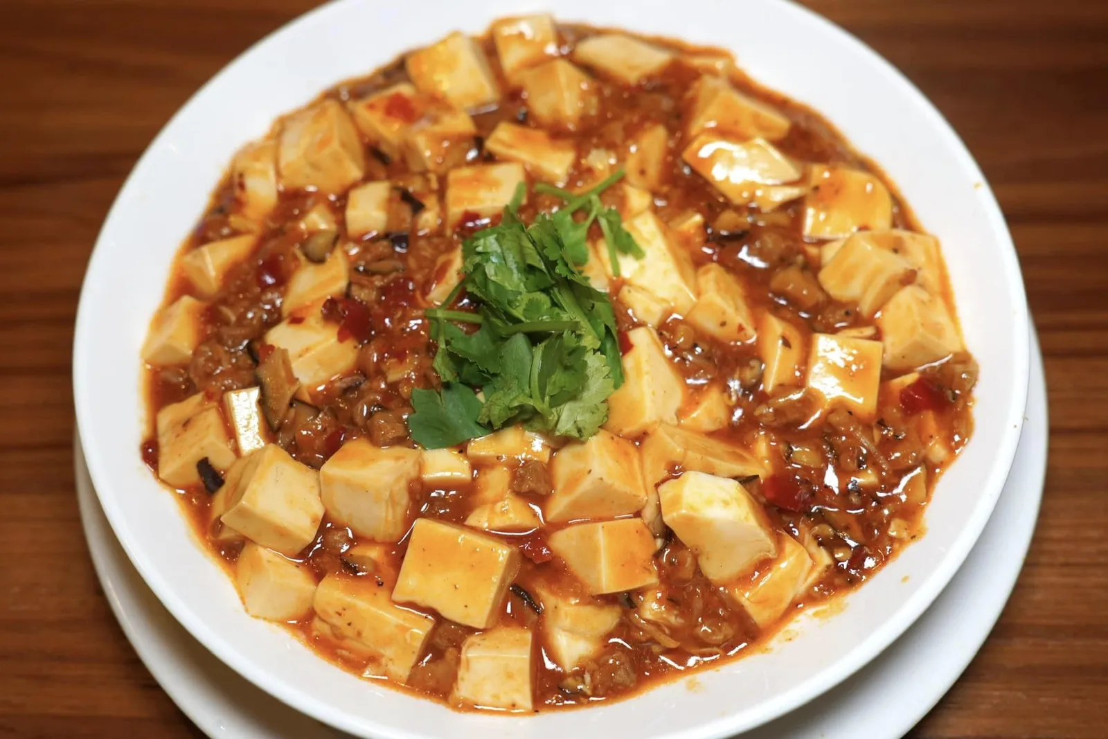 麻婆豆腐 (S) (240 NTD+) Mapo tofu stew (spicy) (tofu, bean sauce, and Chinese red pepper) เต้าหู้หม่าผ่อสูตรพิเศษเคี้ยวนุ่มตัดกันกับเนื้อเทียม นอกจากนี้ยังมีเห็ดเคี้ยวหนึบเข้ากันกับอโรมาของน้ำซอสเข้มข้น (14/20)