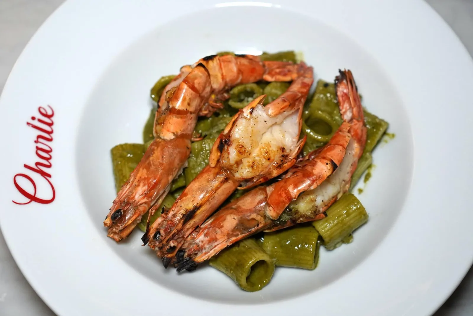 Pistou Tiger Prawn Penne (390++) Grilled Tiger Prawn, Pistou Sauce พาสต้า Calamarata คลุกเคล้ากับซอส Pistou หอมกรุ่นท็อปด้านบนด้วยกุ้งลายเสือย่างจำนวน 3 ตัว