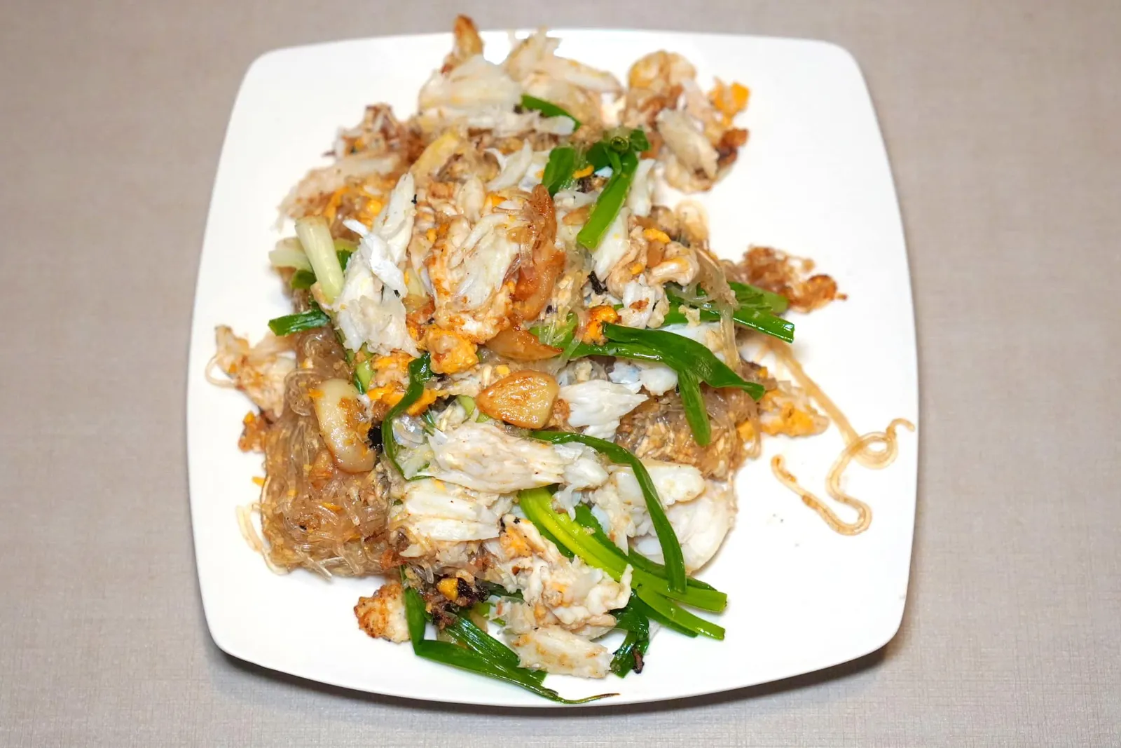 วุ้นเส้นผัดเนื้อปู (350)ห้ามพลาดเมนูวุ้นเส้นที่ผ่านการผัดในกระทะด้วยไฟแรงกับเนื้อปูจนหอม รสหวานของเนื้อปูเคล้ากันไปกับกลิ่นของกระเทียมและกลิ่นหอมกระทะได้อย่างไร้ที่ติ (14/20)