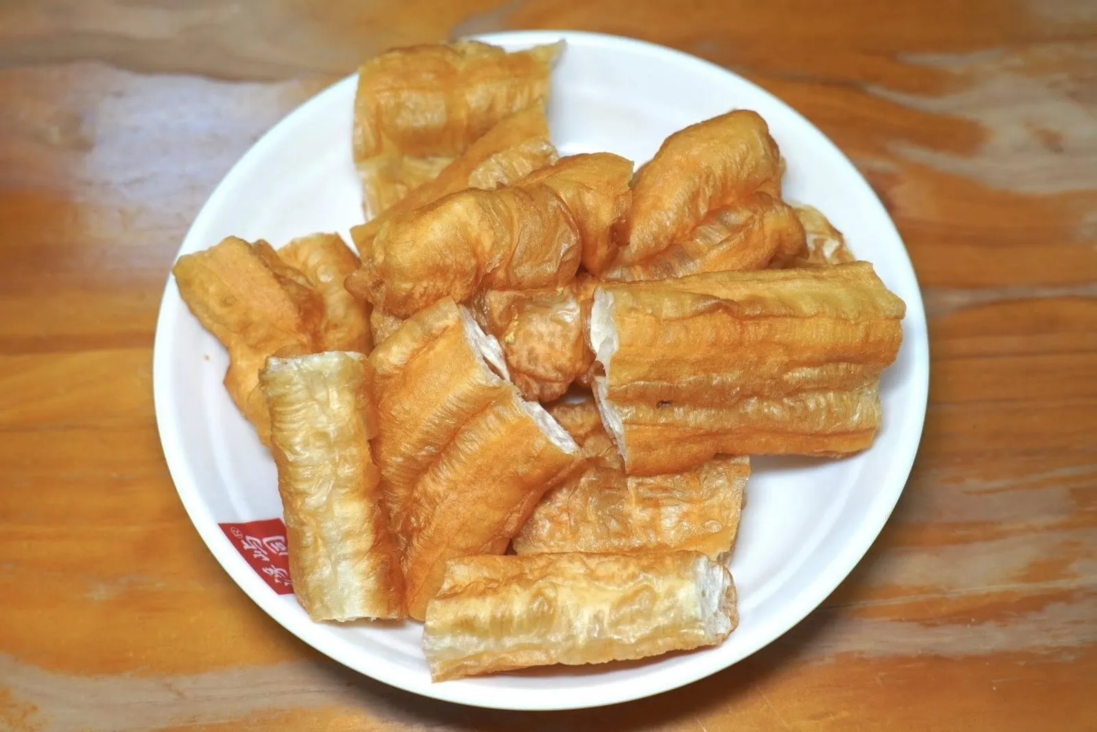 油条 (2 CNY)Fried Dough Stickขอแนะนำให้จับคู่กับ 油条 หรือที่คนไทยเรียกว่าปาท่องโก๋ซึ่งจะดูดน้ำซุปเข้าไปในตัวแป้งจนนุ่มฉ่ำเข้ากันได้ดีเป็นที่สุด