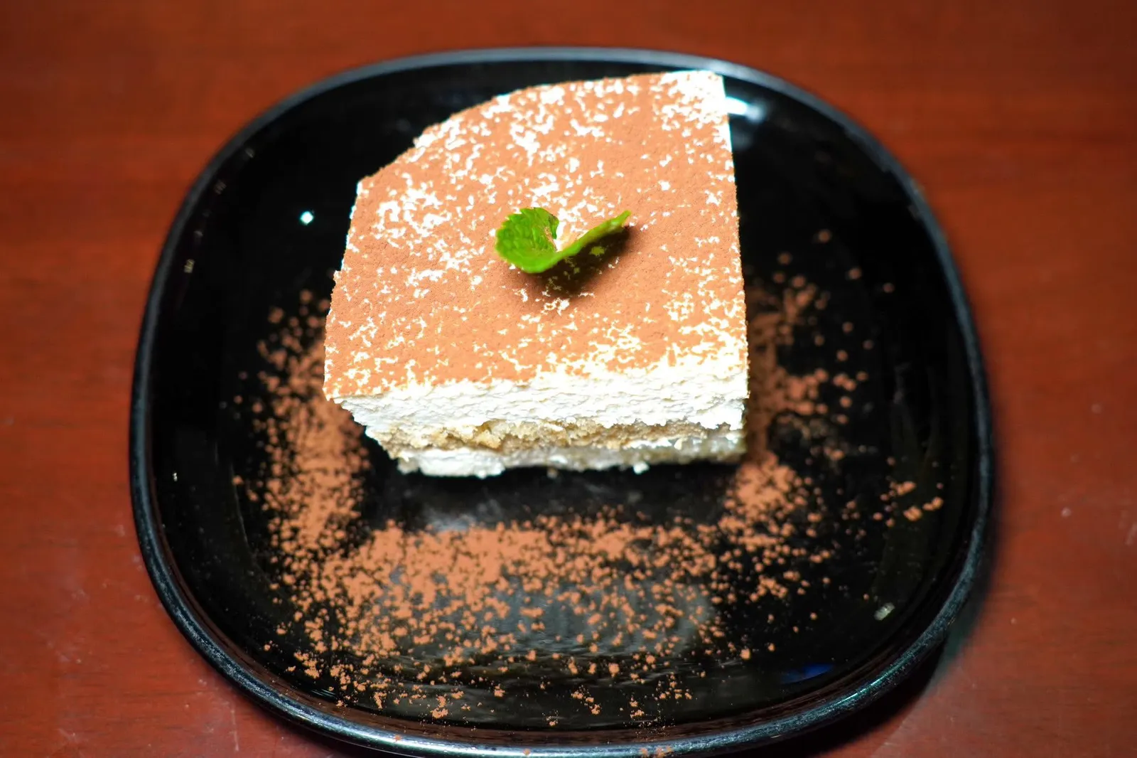 Tiramisu (85)Espresso soaked ladyfingers layered with light filling cream with mascarponeเลดี้ฟิงเกอร์จุ่มในกาแฟเอสเปรซโซ่จนชุ่มวางสลับมากับมัสคาโปเน่ชีสหอมมัน (12/20)