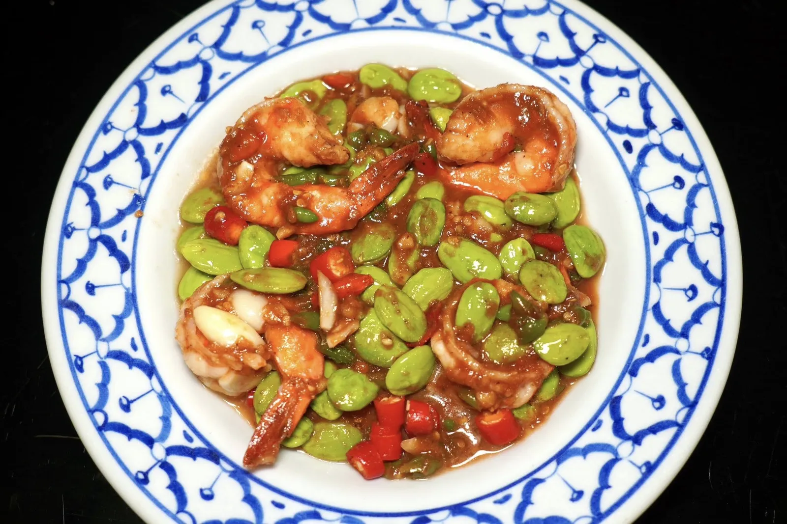 กุ้งผัดสะตอกะปิ (200)กุ้งสด ๆ เนื้อเด้ง ๆ ผัดกับกะปิอย่างดีให้รสชาติเค็มอุมามิตัดกันกับความกรอบและฉุนของสะตอได้อย่างลงตัว (14/20)